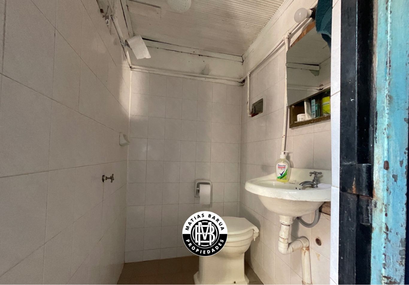 Terreno en venta en Villa Sarita, con construccion a Reciclar 